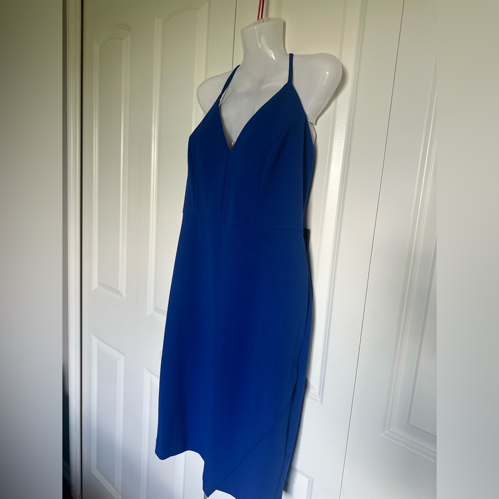 Blue short Bebe dress with lace racer back. NWT. Night out dress.
